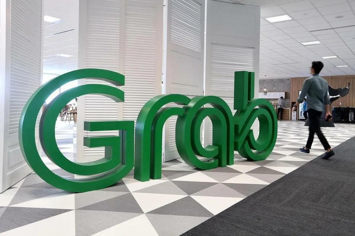 Grab ia în considerare listarea secundară din Singapore după fuziunea americană SPAC, susțin sursele