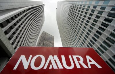 Nomura marchează pierderi de 2 miliarde de dolari, anulând emiterea de obligațiuni în timp ce acțiunile scad
