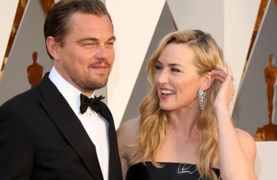 Kate Winslet poartă o coafură dezordonată pe un afiș al filmului Titanic care promovează lansarea viitoare