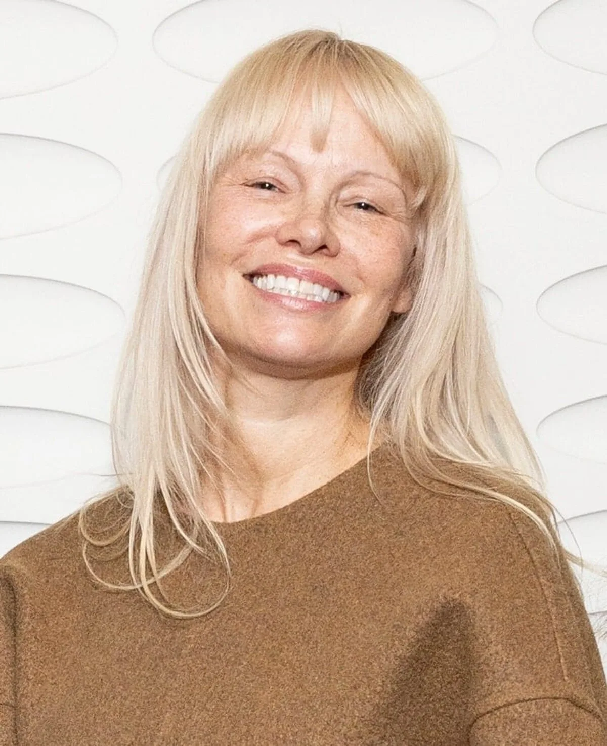 Pamela Anderson și-a făcut breton exact la timp pentru prima sa nominalizare la Globurile de Aur – Vezi fotografiile