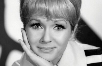 Optimistul neînfrânat: Strălucirea neclintită a lui Debbie Reynolds