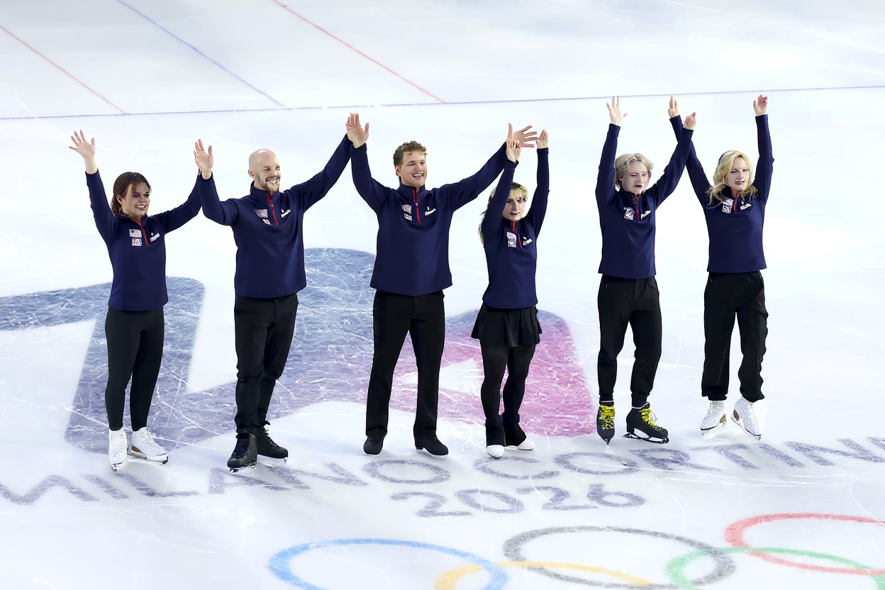 (L-R) Ellie Kam, Danny O'Shea, Madison Chock, Evan Bates, Alysa Liu, Ilia Malinin and Amber Glenn of Team United States perform in the Team Event routine during a Figure Skating Exhibition Gala on day fifteen of the Milano Cortina 2026 Winter Olympic games at Milano Ice Skating Arena on February 21, 2026 in Milan, Italy.