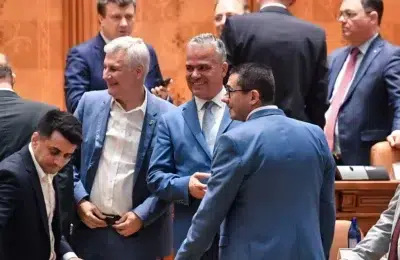 Guvernul Vestea pica in Parlament cu 189 de voturi. Andrei Cornea critica negocierile cu AUR