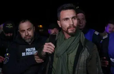Fostul colaborator al lui Calin Georgescu primeste avertisment pentru troita cu simbol legionar