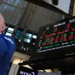 Fitch anunta o corectie majora pe piata tehnologiei. Investitiile in AI ating 700 de miliarde