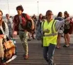 Zeci de mii de turisti evacuati cu barcile din Franta. Spania declara stare de urgenta nationala