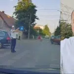 Masina neasigurata ruleaza singura in intersectie. Politist la un pas sa fie lovit din spate